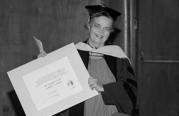 older woman with diploma